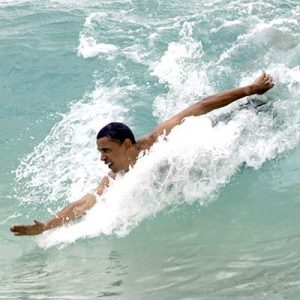 President Obama bodysurfing