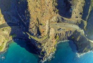 Tunnel through sheer cliffs on Maui's Pali Highway.